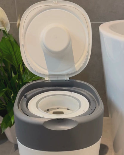 Rotationsklämma til universalkassett till blöjhink